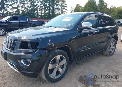 2014 Jeep Grand Cherokee Overland из США, поврежденный, VIN 1C4RJECG4EC410218